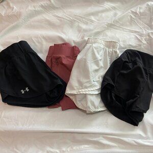 Lot of 4 pairs of women's athletic running shorts size small and medium